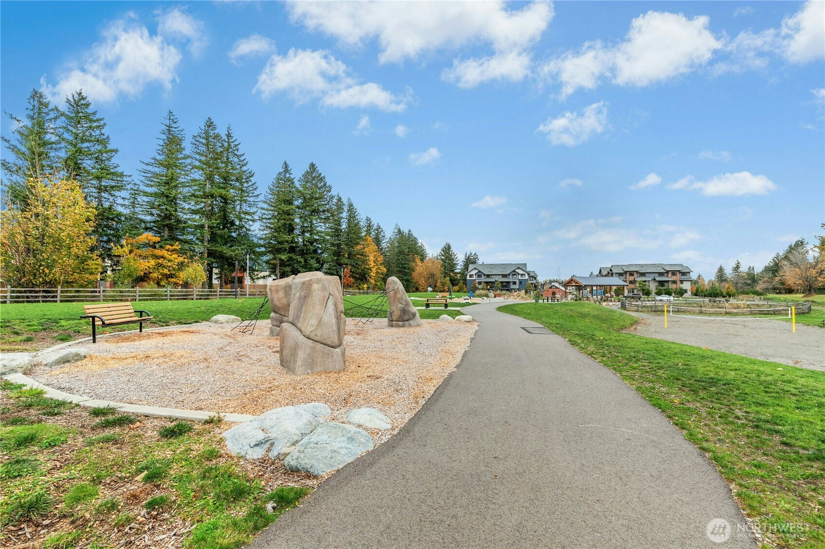 1845 Southeast 12th Place, Unit H204 North Bend, WA 98045 - Photo 30 of 31 a view of a lake with a yard