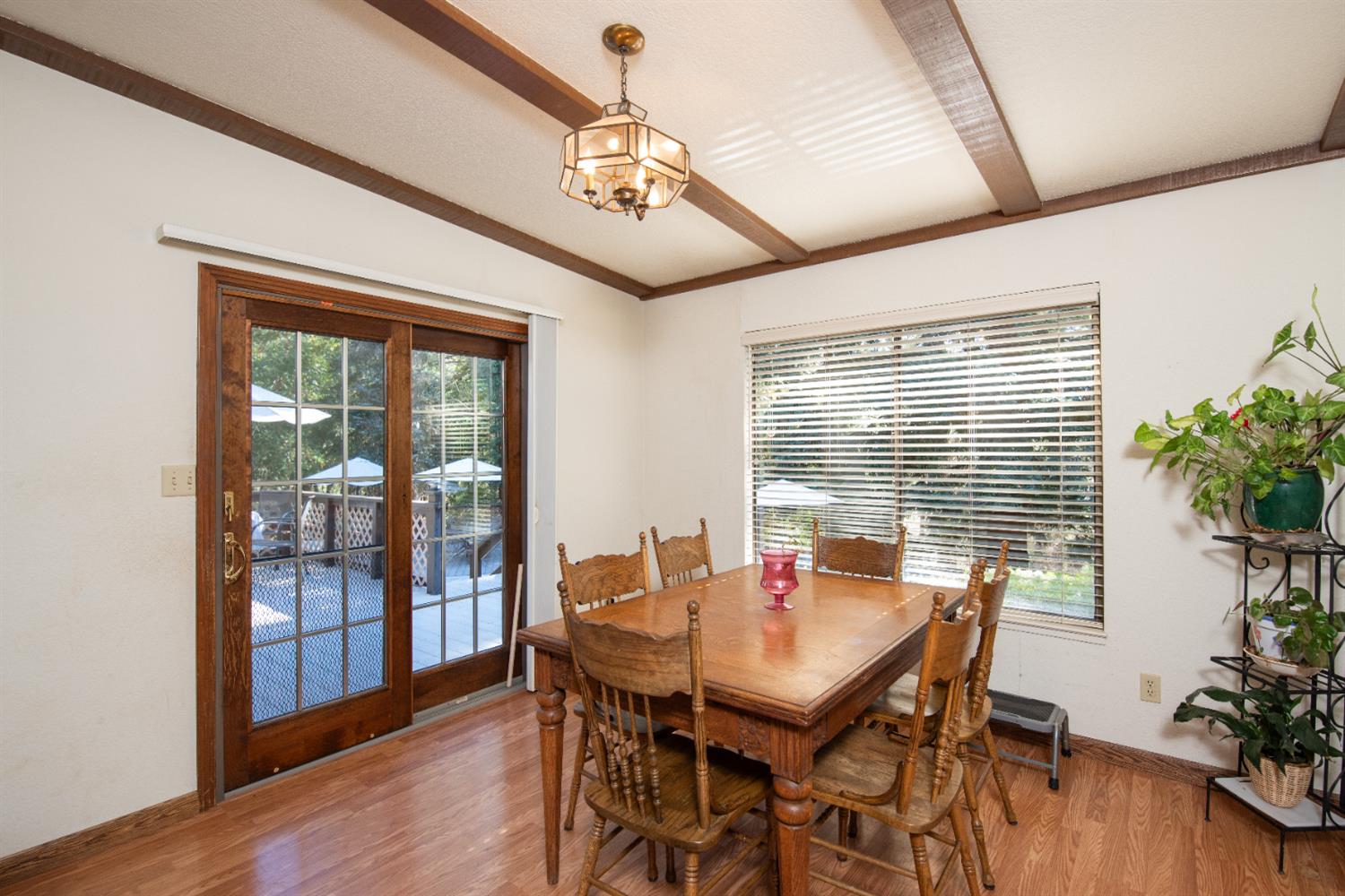 16979 Ridge Road Pine Grove, CA 95665 - Photo 13 of 68 a view of a dining room with furniture window and wooden floor