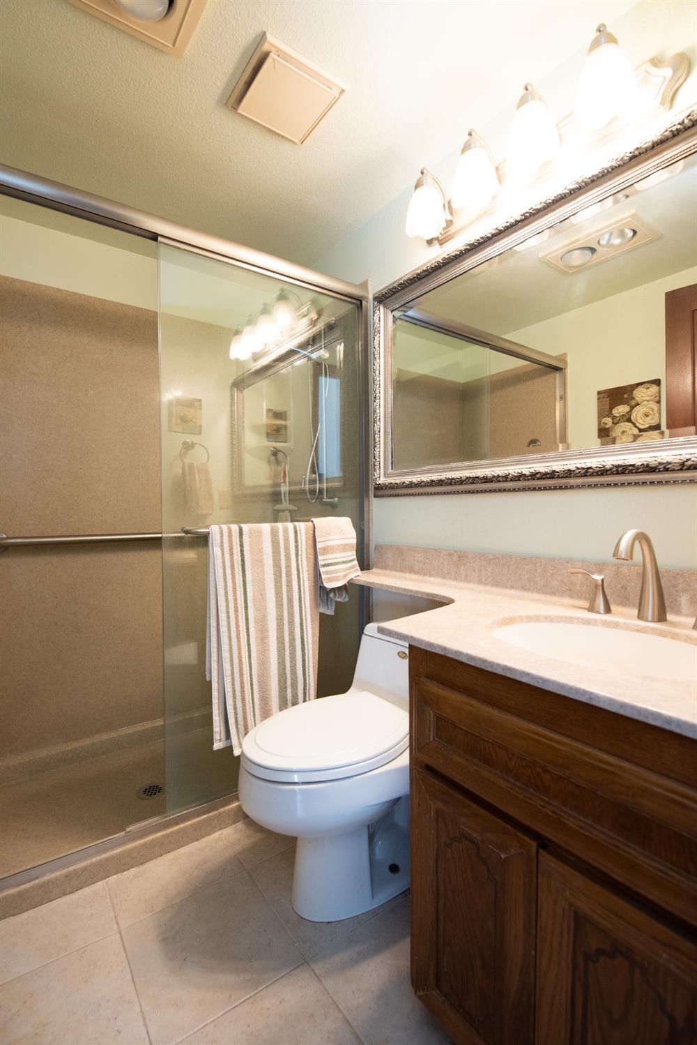 16979 Ridge Road Pine Grove, CA 95665 - Photo 20 of 68 a bathroom with a sink a toilet and shower