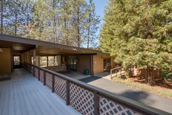 a balcony with wooden floor