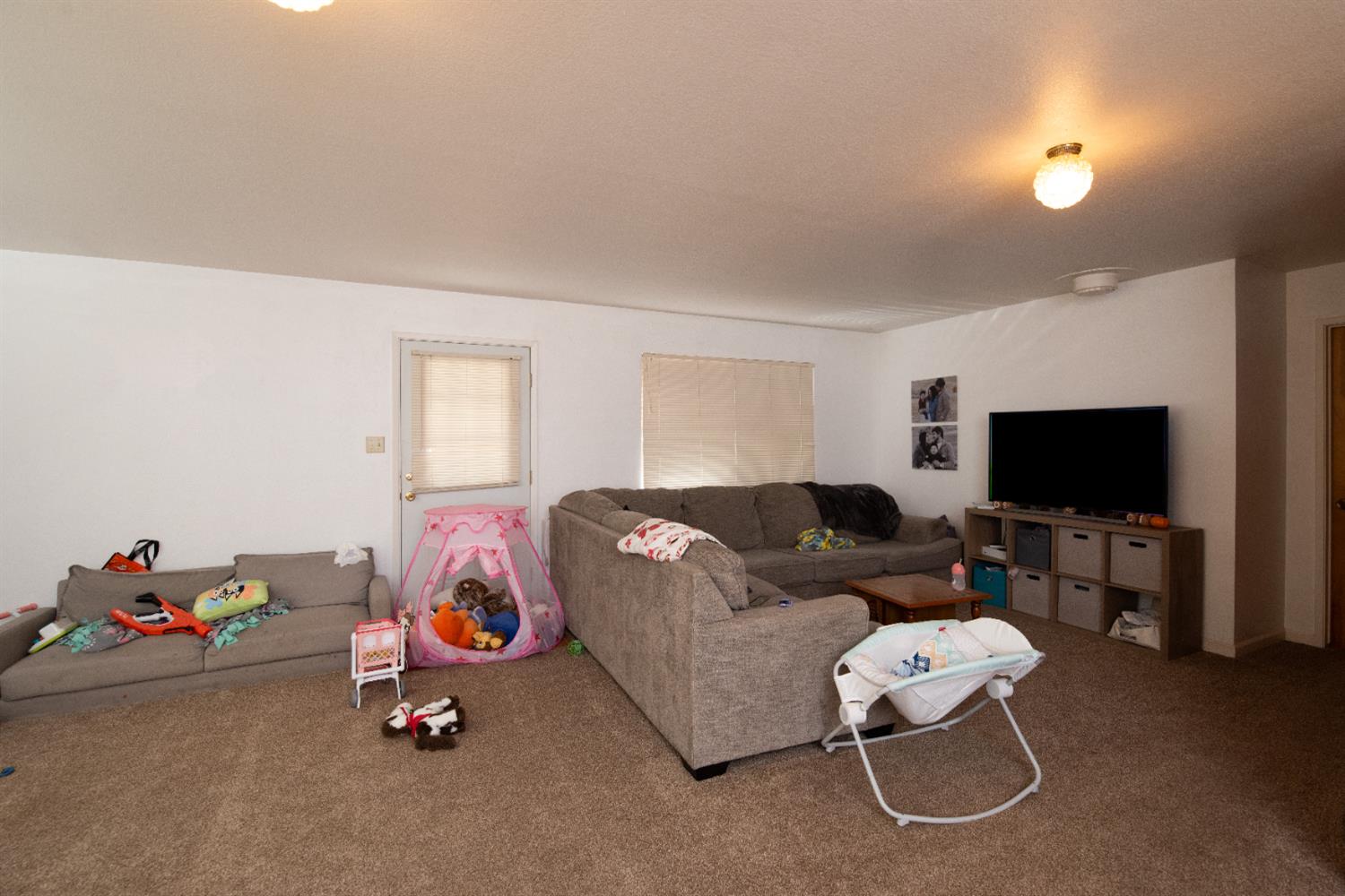 16979 Ridge Road Pine Grove, CA 95665 - Photo 48 of 68 a living room with furniture and a flat screen tv
