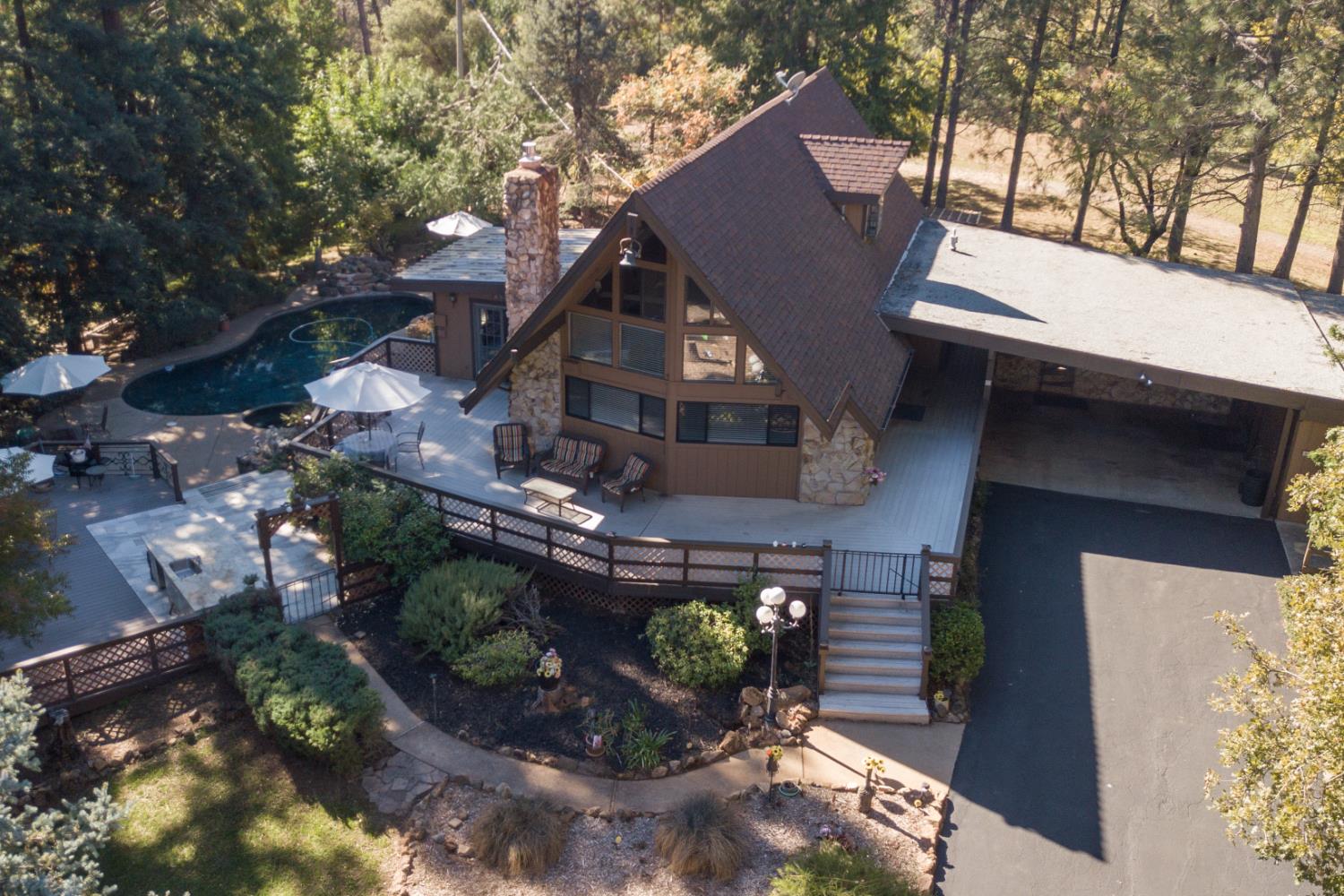 16979 Ridge Road Pine Grove, CA 95665 - Photo 66 of 68 a front view of a house with garden