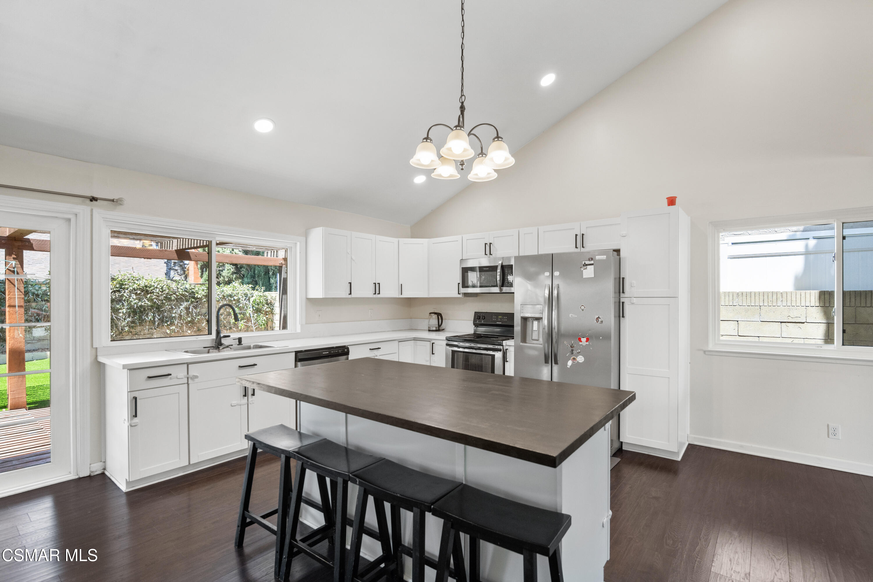 2367 St Clair Avenue Simi Valley, CA 93063 - Photo 12 of 41 a kitchen that has a lot of cabinets furniture and wooden floor