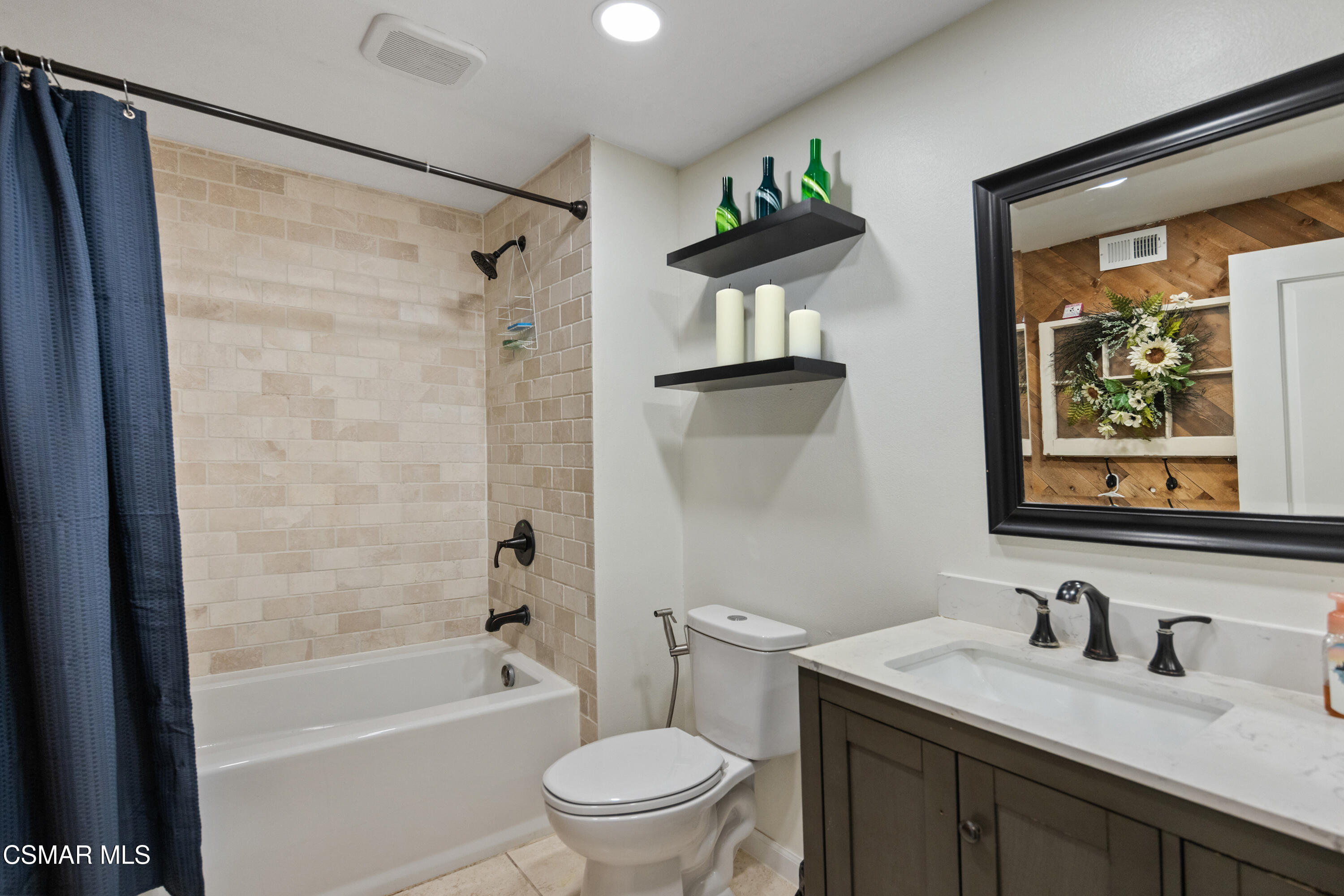 2367 St Clair Avenue Simi Valley, CA 93063 - Photo 18 of 41 a bathroom with a granite countertop sink toilet and shower