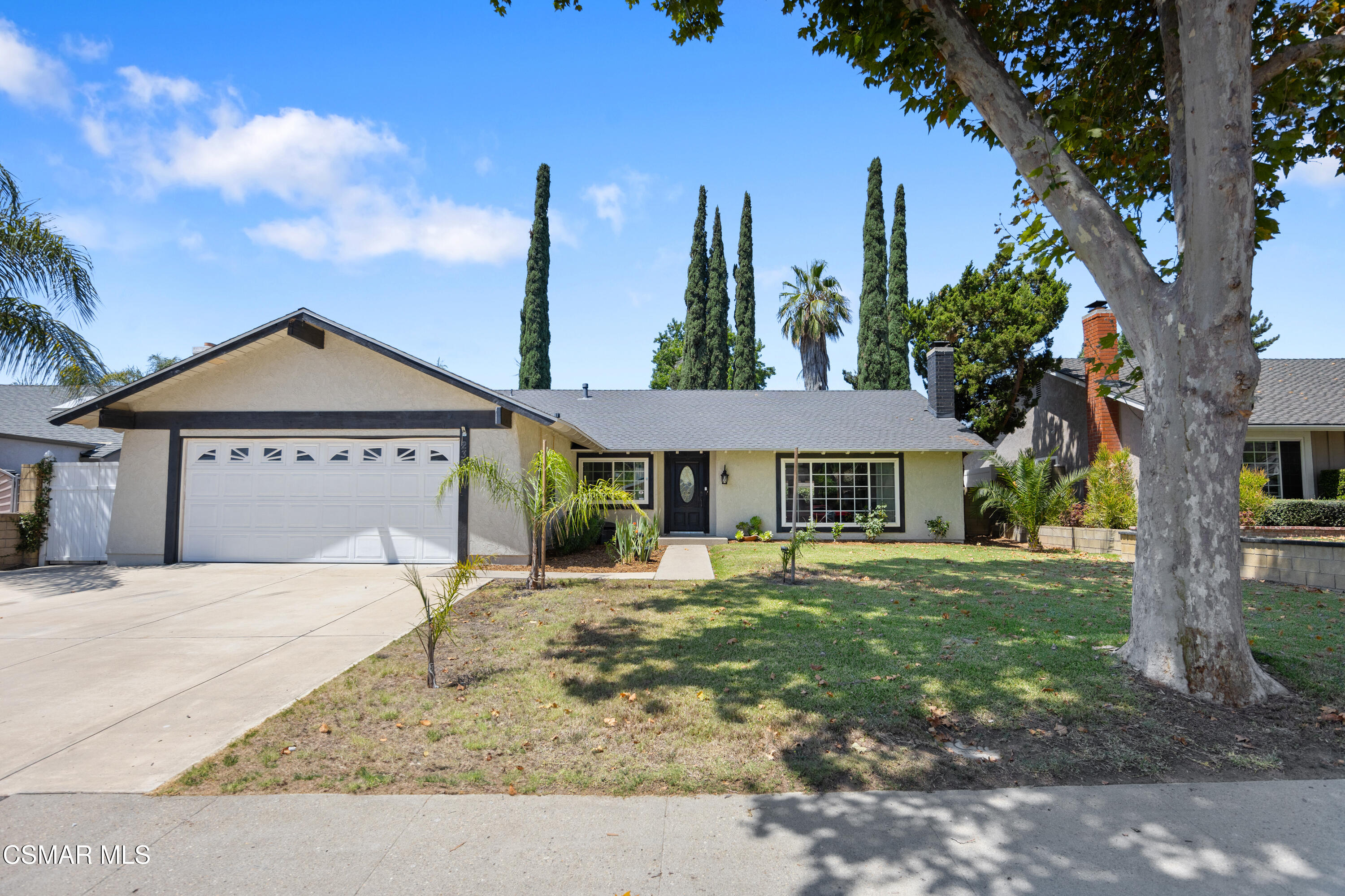 2367 St Clair Avenue Simi Valley, CA 93063 - Photo 2 of 41 a house with trees in front of it