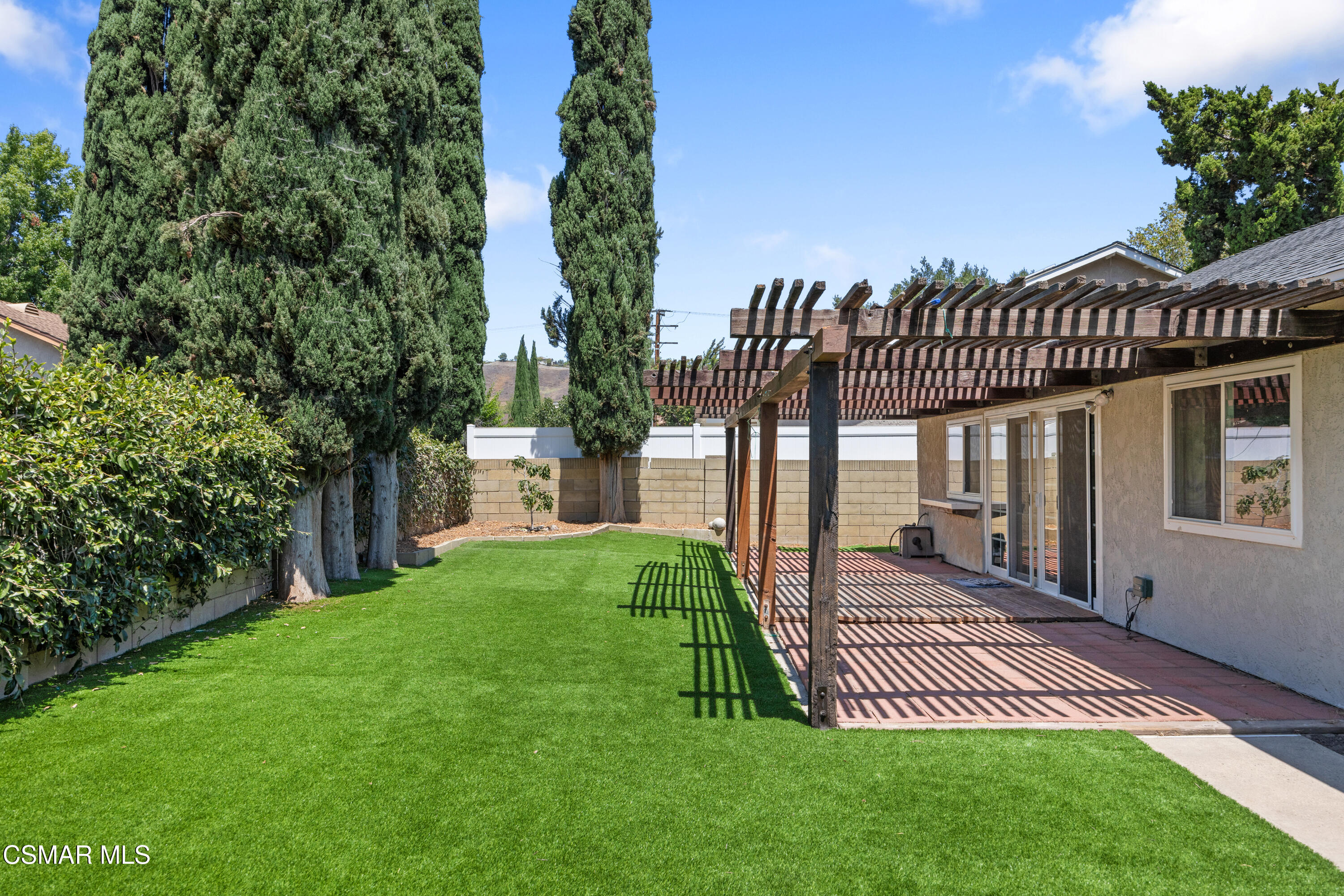 2367 St Clair Avenue Simi Valley, CA 93063 - Photo 24 of 41 a view of a house with a yard and deck