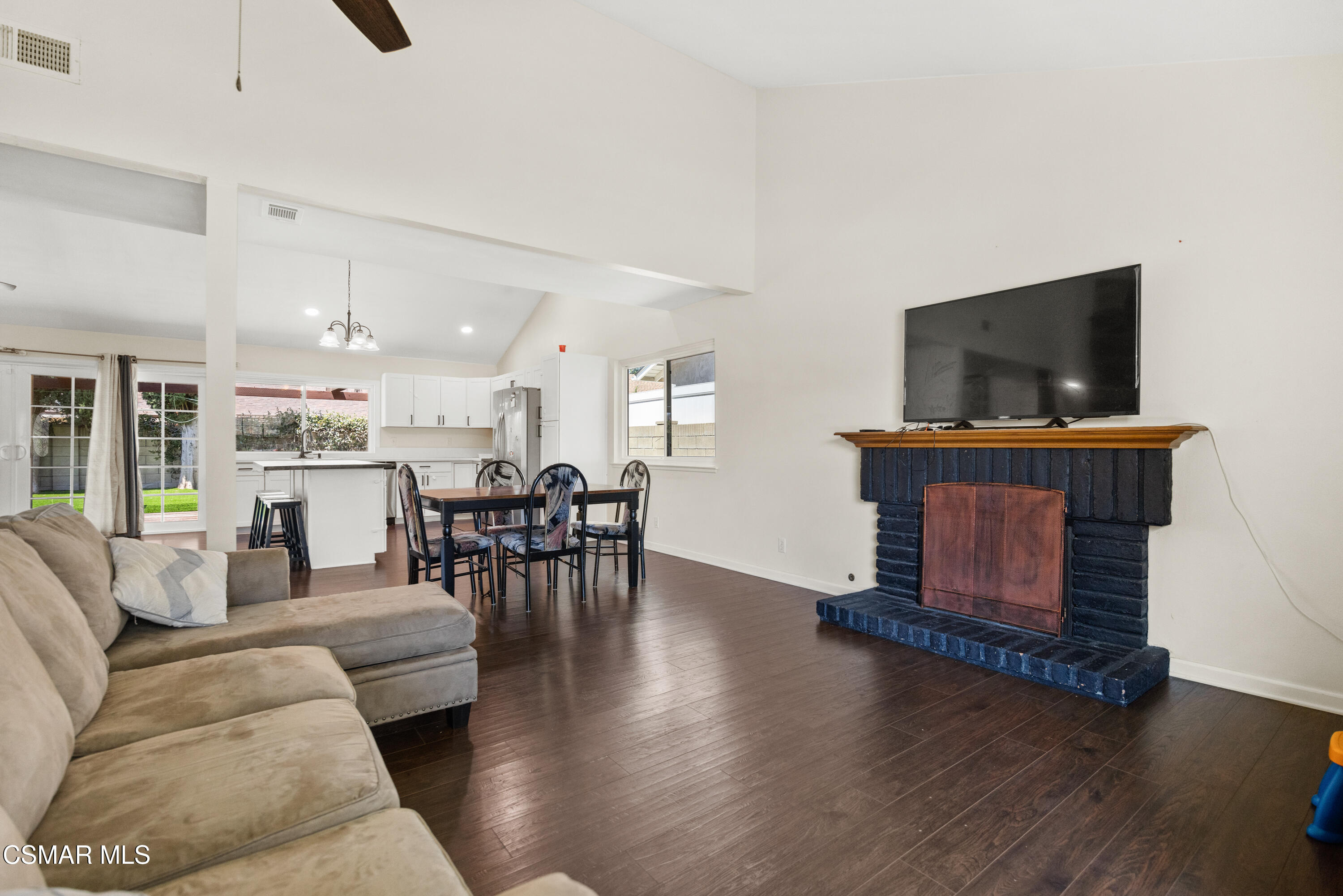 2367 St Clair Avenue Simi Valley, CA 93063 - Photo 5 of 41 a living room with furniture and a flat screen tv