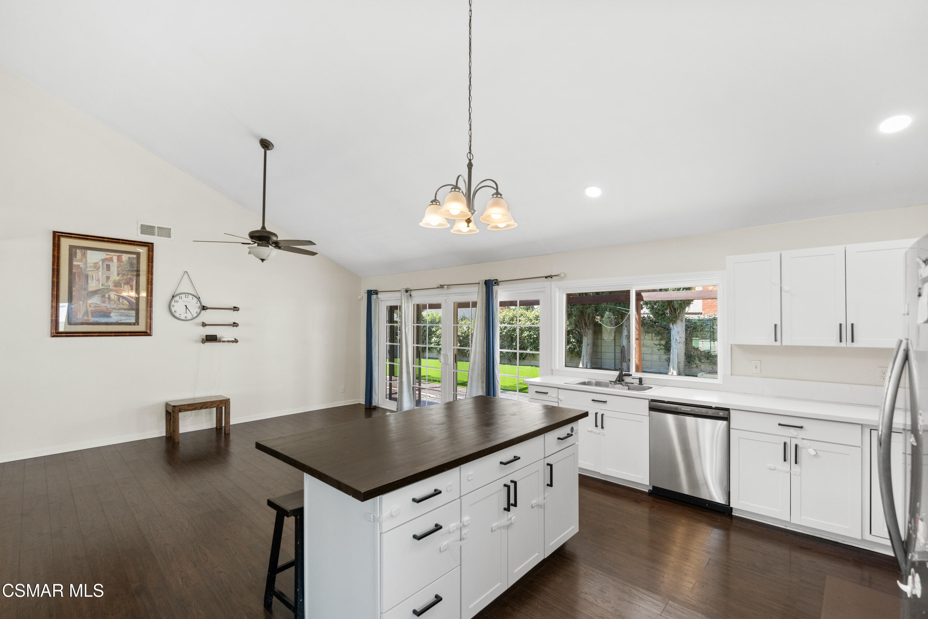 2367 St Clair Avenue Simi Valley, CA 93063 - Photo 8 of 41 a kitchen with stainless steel appliances granite countertop a sink a stove and a refrigerator