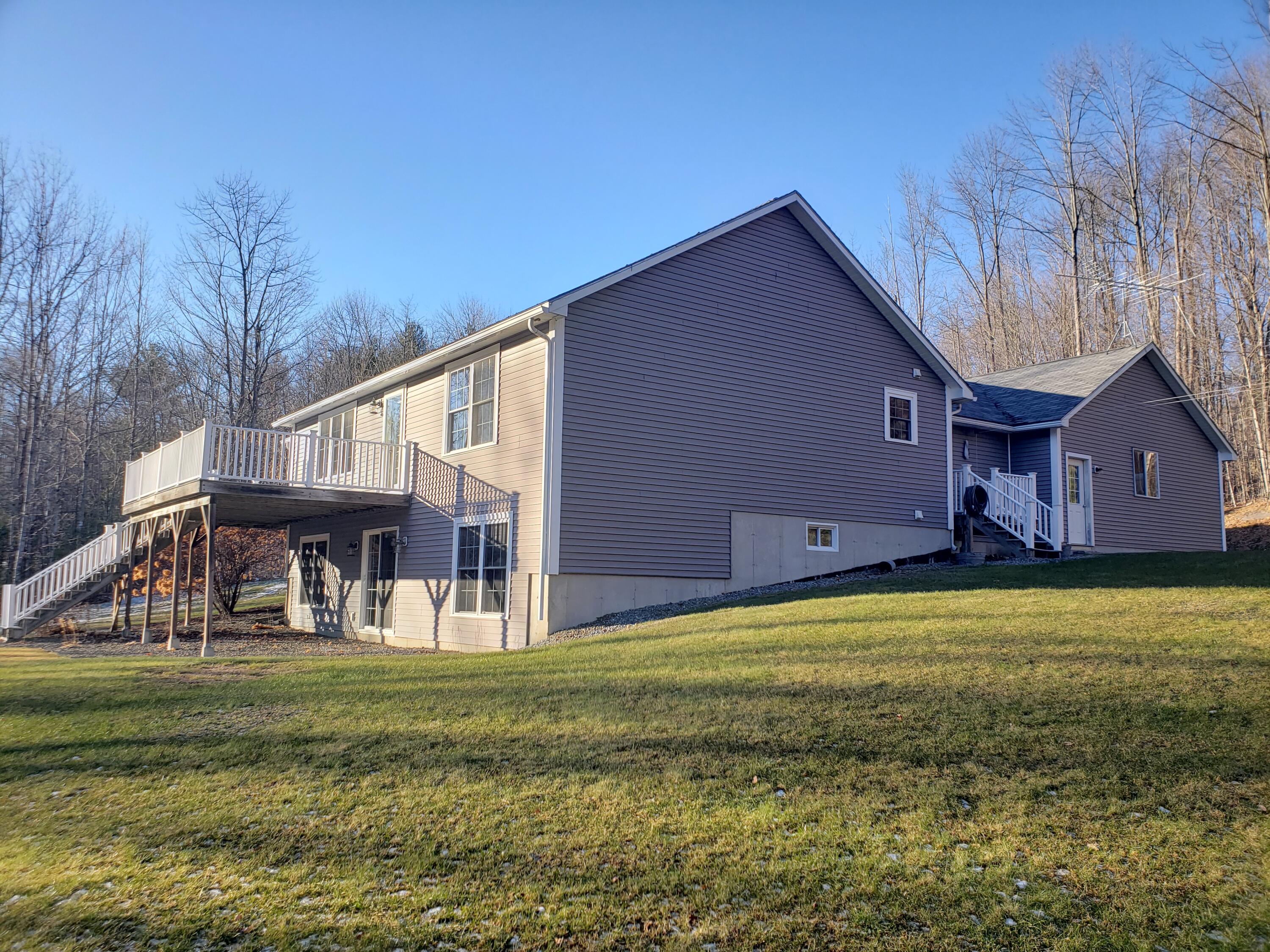 63 Walker Hill Road Jay, ME 04239 - Photo 8 of 76 Large Deck w/ composite decking.