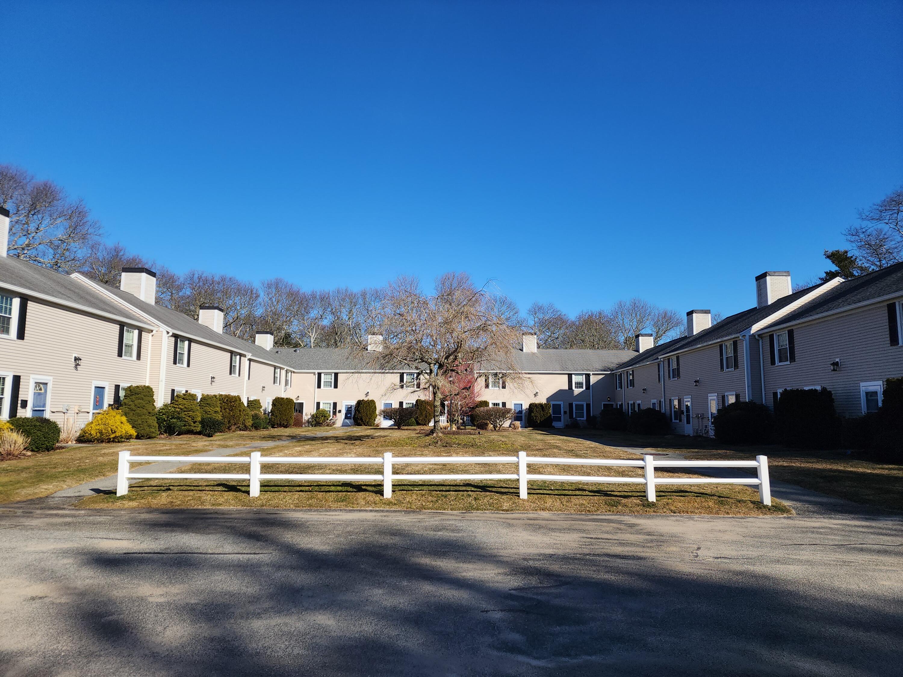 a view of a big yard with an outdoor space
