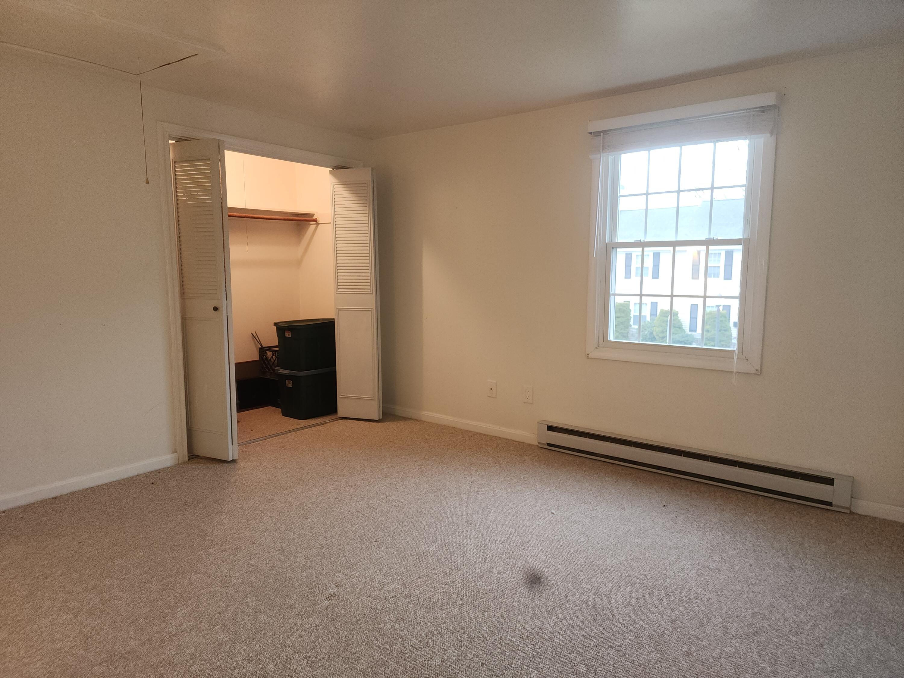 272 Craigville Beach Road, Unit 4 Hyannis, MA 02601 - Photo 21 of 33 an empty room with windows