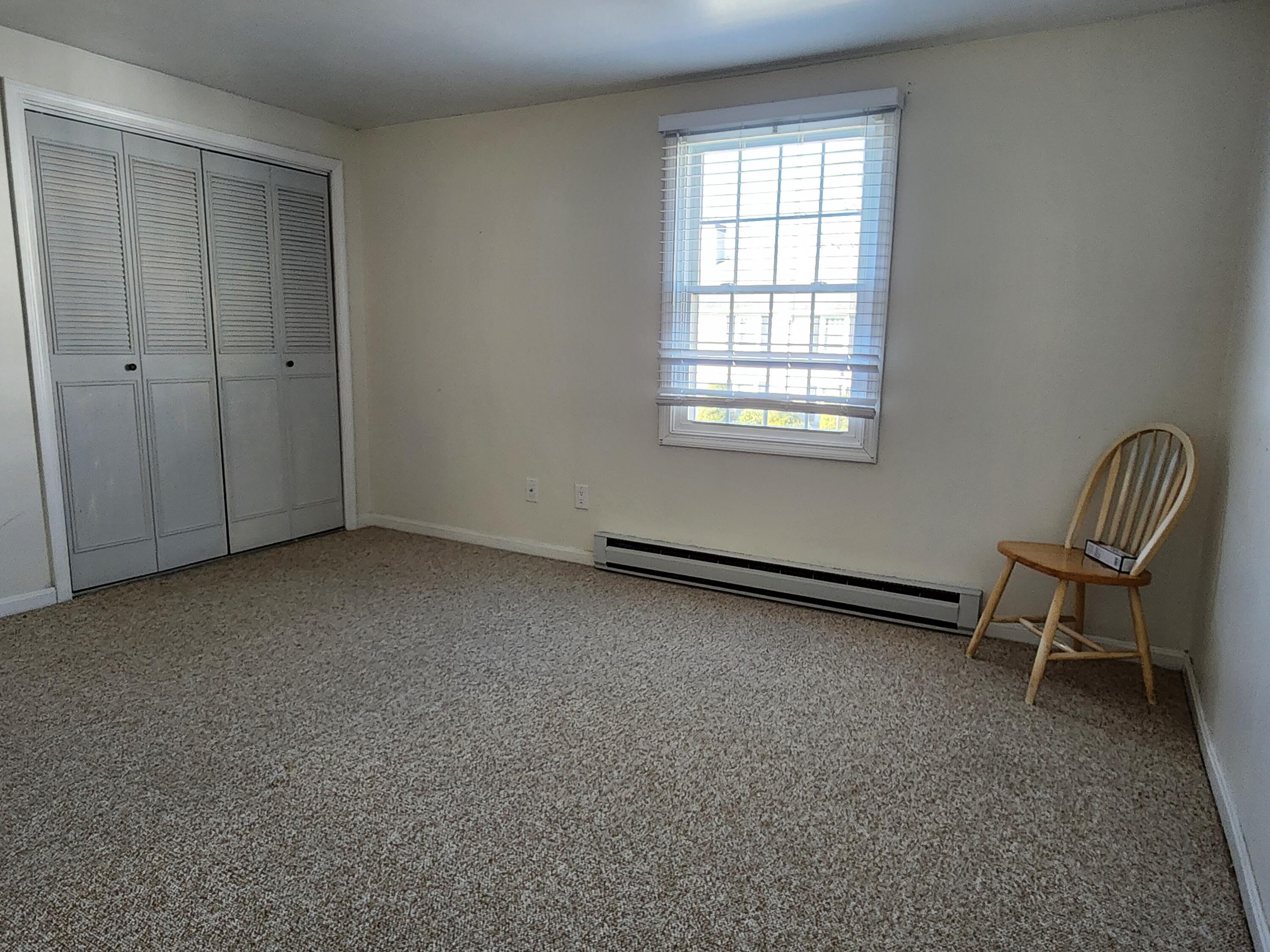 272 Craigville Beach Road, Unit 4 Hyannis, MA 02601 - Photo 22 of 33 a view of room with window and lounge chair
