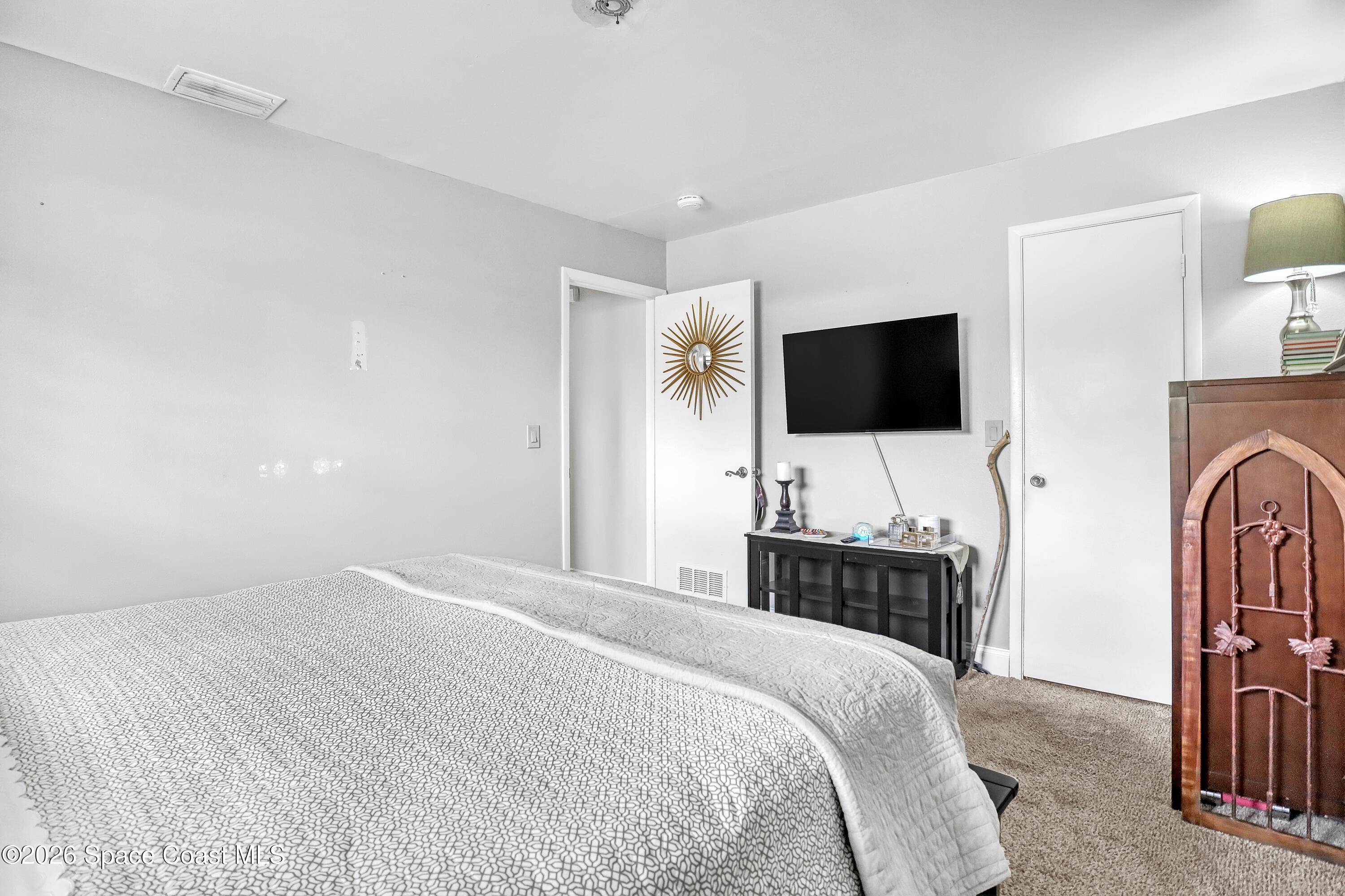 858 Carnival Road Southeast Palm Bay, FL 32909 - Photo 14 of 21 Master Bedroom