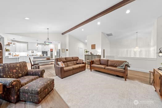 10218 45th Street East Edgewood, WA 98372 - Photo 11 of 34 a living room with furniture and a large window