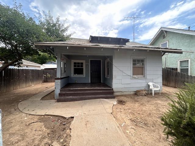 a view of a house with roof yard