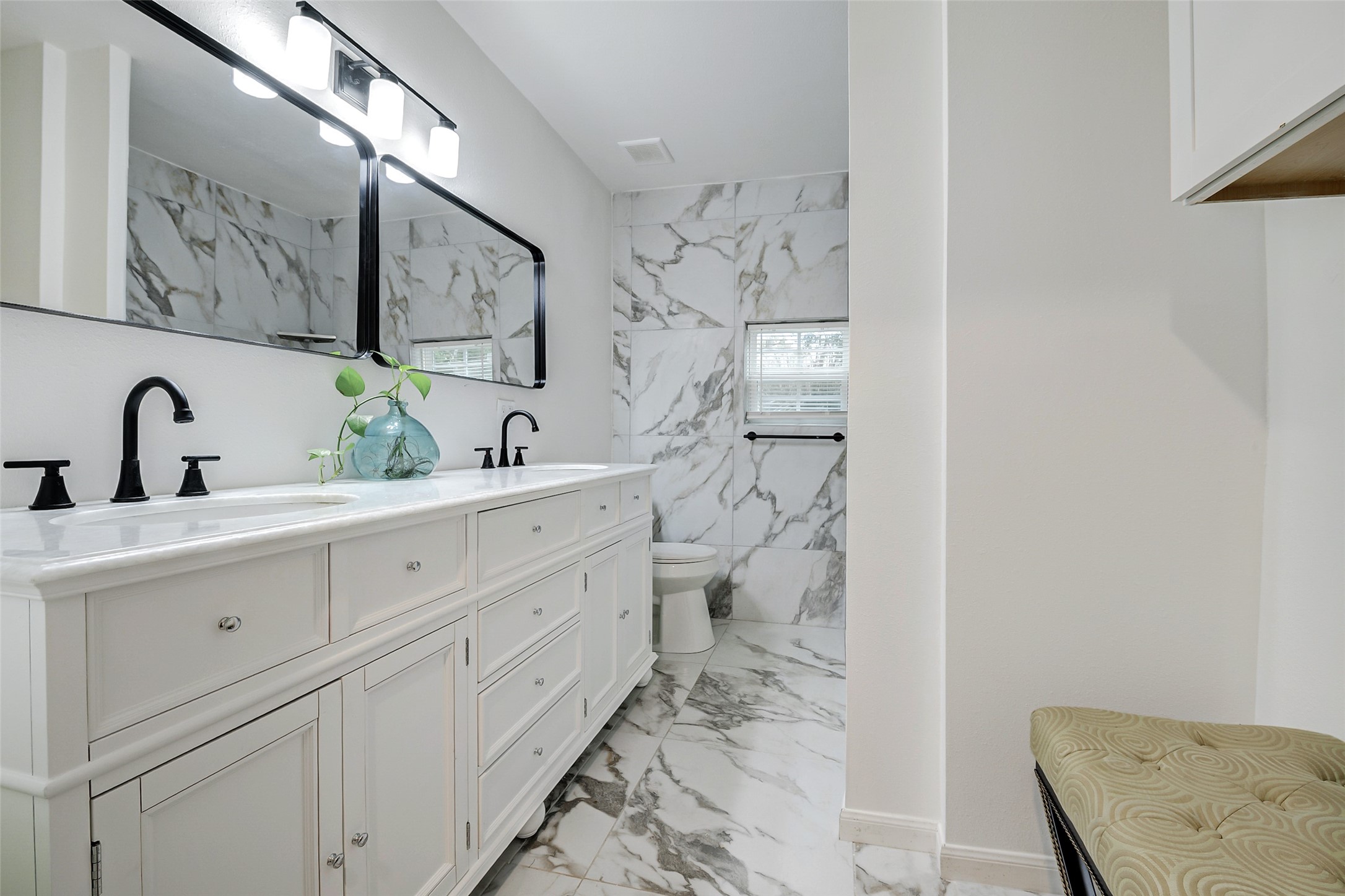 706 Beaumont Street Anahuac, TX 77514 - Photo 15 of 39 a bathroom with a double vanity sink mirror and toilet