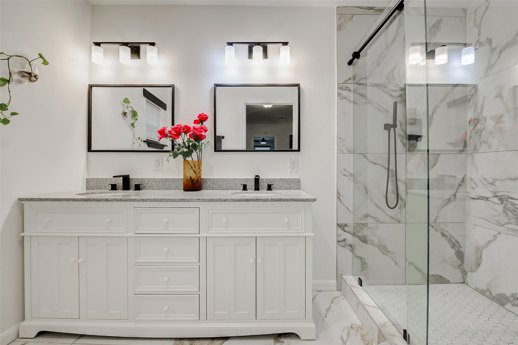706 Beaumont Street Anahuac, TX 77514 - Photo 22 of 39 a bathroom with a sink vanity and a mirror