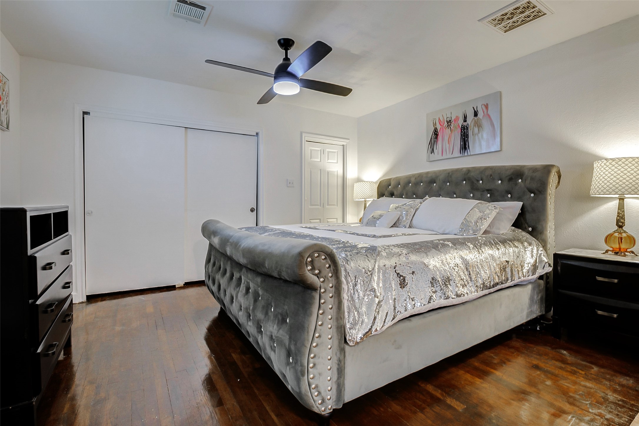 706 Beaumont Street Anahuac, TX 77514 - Photo 24 of 39 a bedroom with a bed and a tv