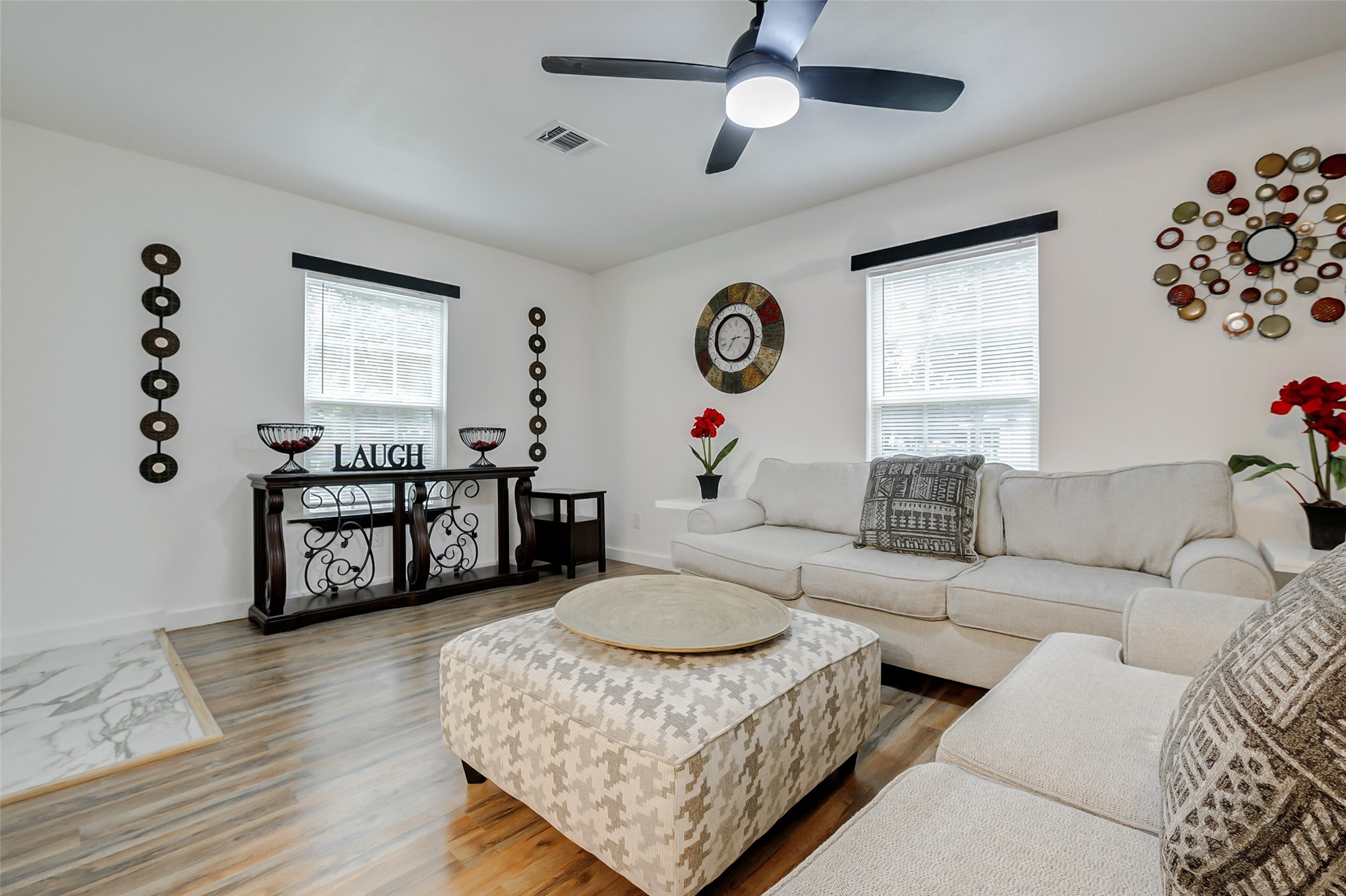 706 Beaumont Street Anahuac, TX 77514 - Photo 29 of 39 a living room with furniture and wooden floor