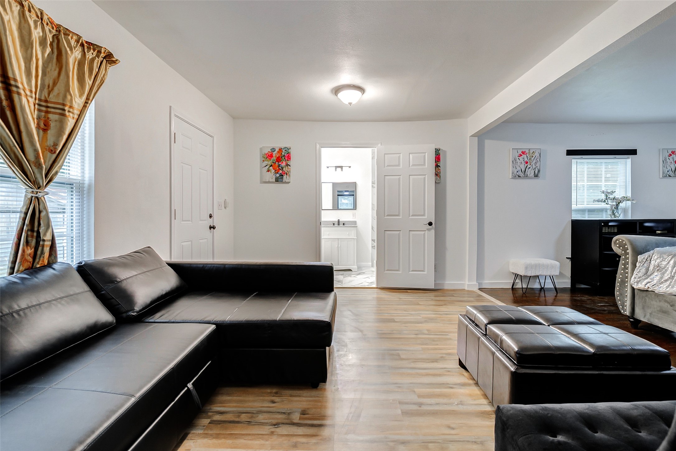 706 Beaumont Street Anahuac, TX 77514 - Photo 32 of 39 a bedroom with furniture and a couch