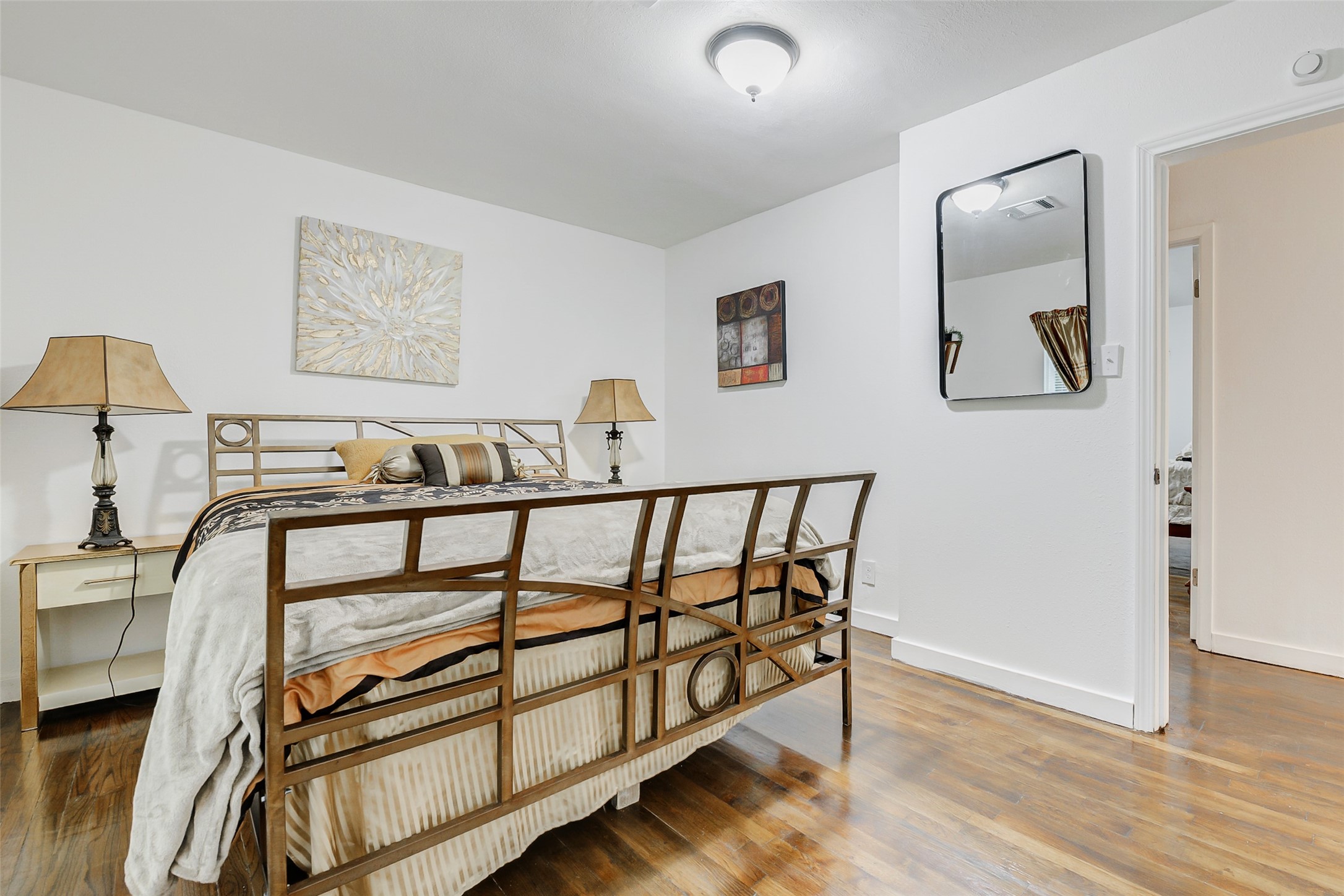 706 Beaumont Street Anahuac, TX 77514 - Photo 33 of 39 a view of staircase with furniture and wooden floor