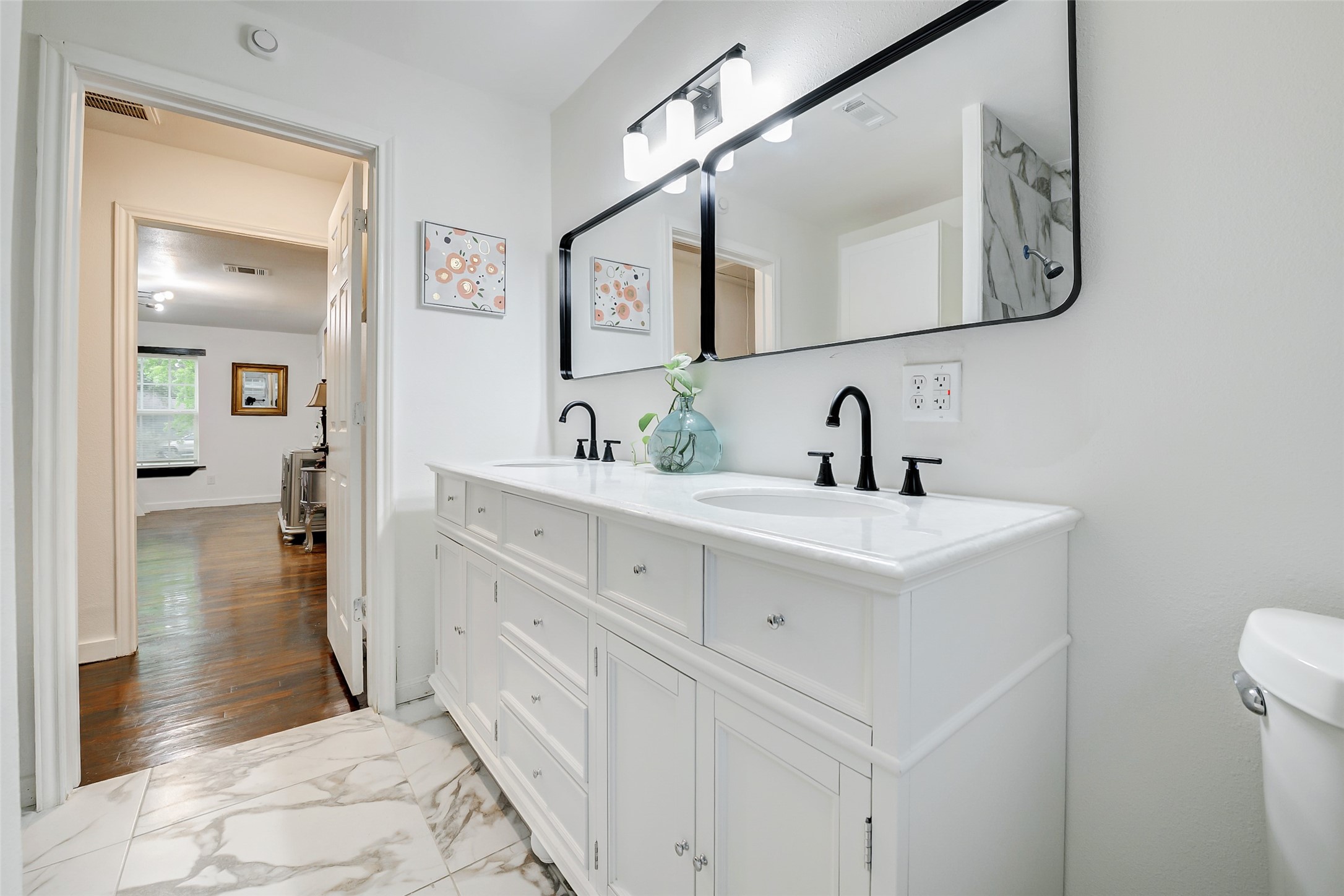 706 Beaumont Street Anahuac, TX 77514 - Photo 9 of 39 a bathroom with a sink and a mirror