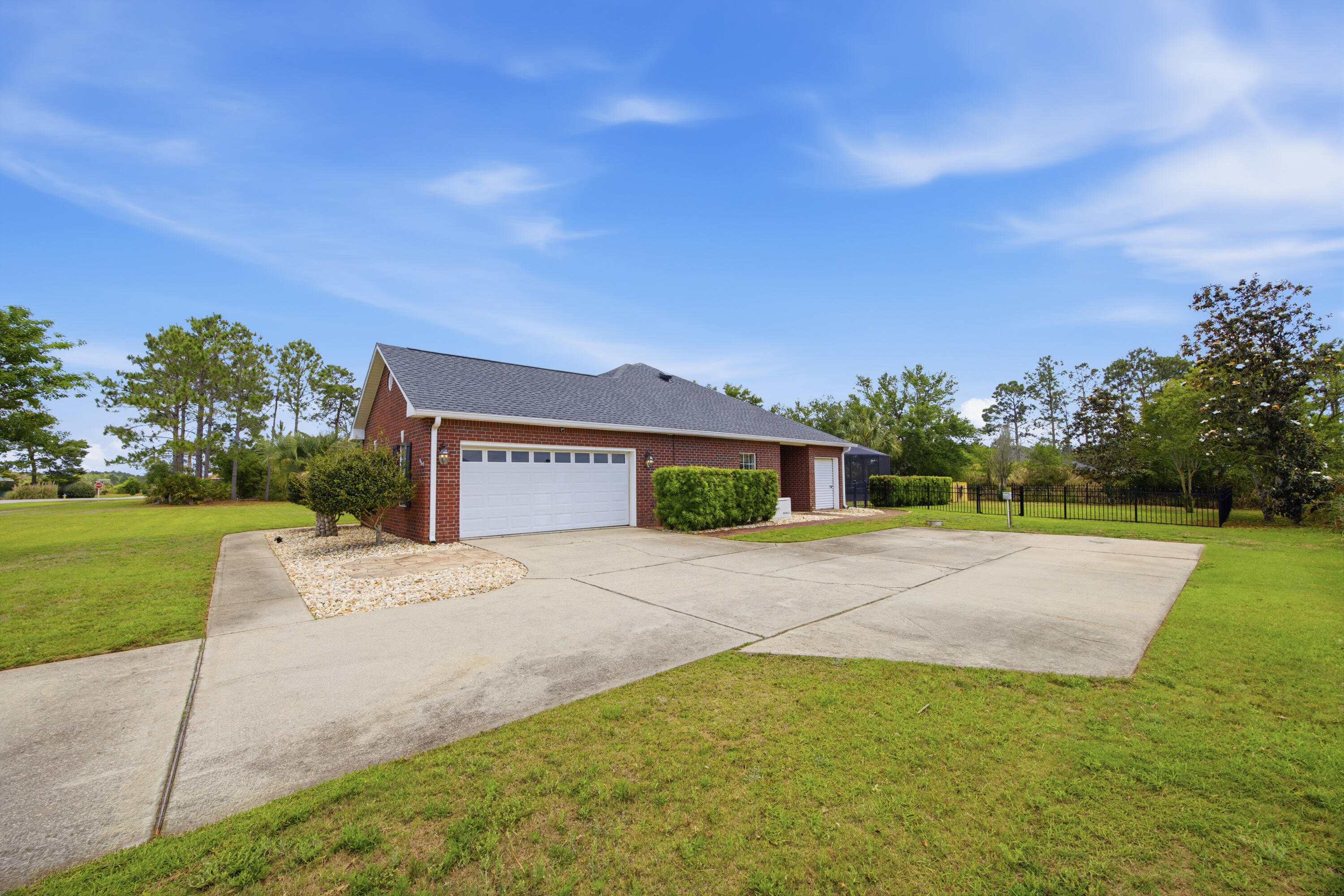 51 Tournament Lane Freeport, FL 32439 - Photo 12 of 71 a house with yard in front of it