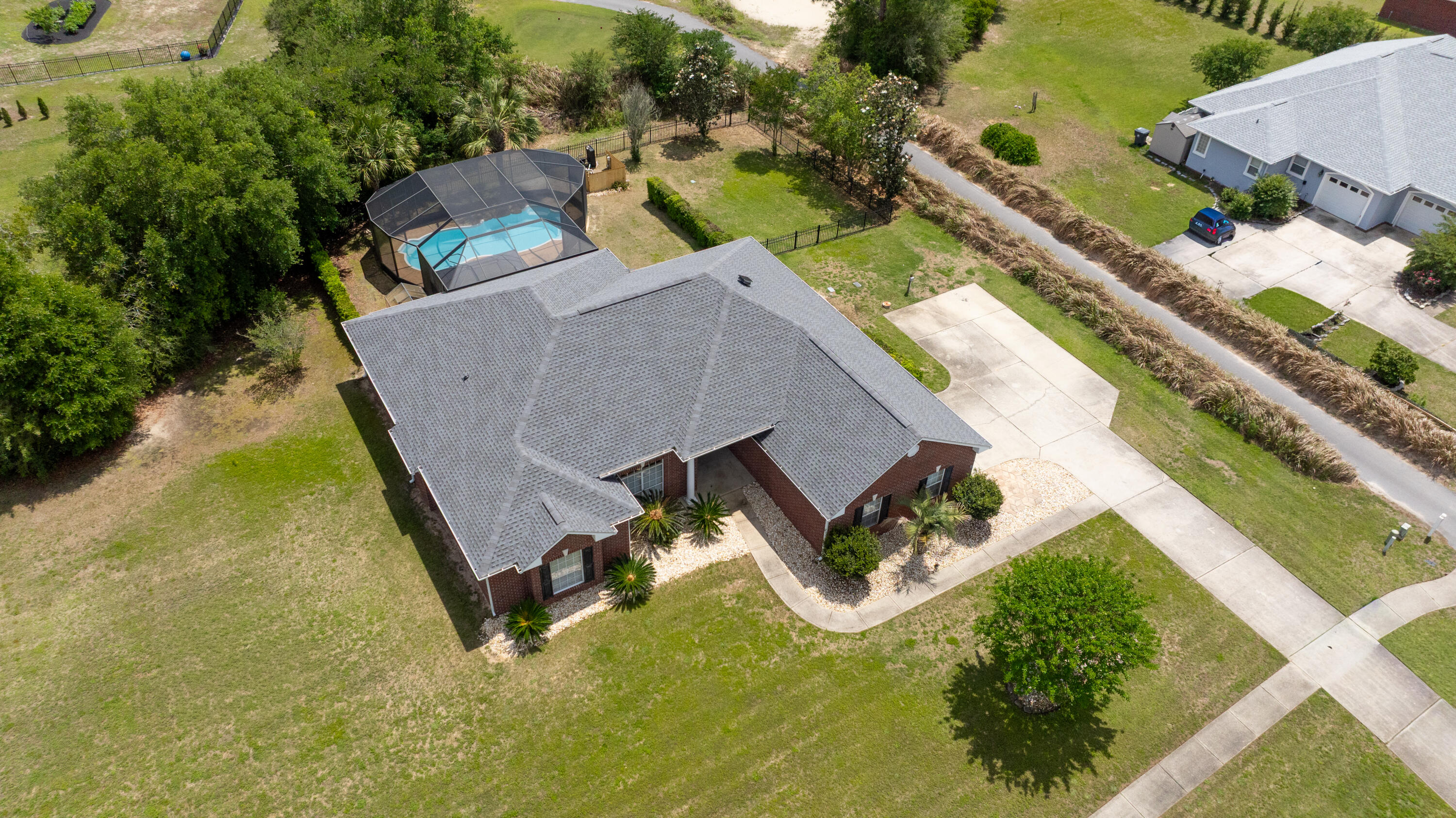 51 Tournament Lane Freeport, FL 32439 - Photo 5 of 71 an aerial view of a house with a swimming pool