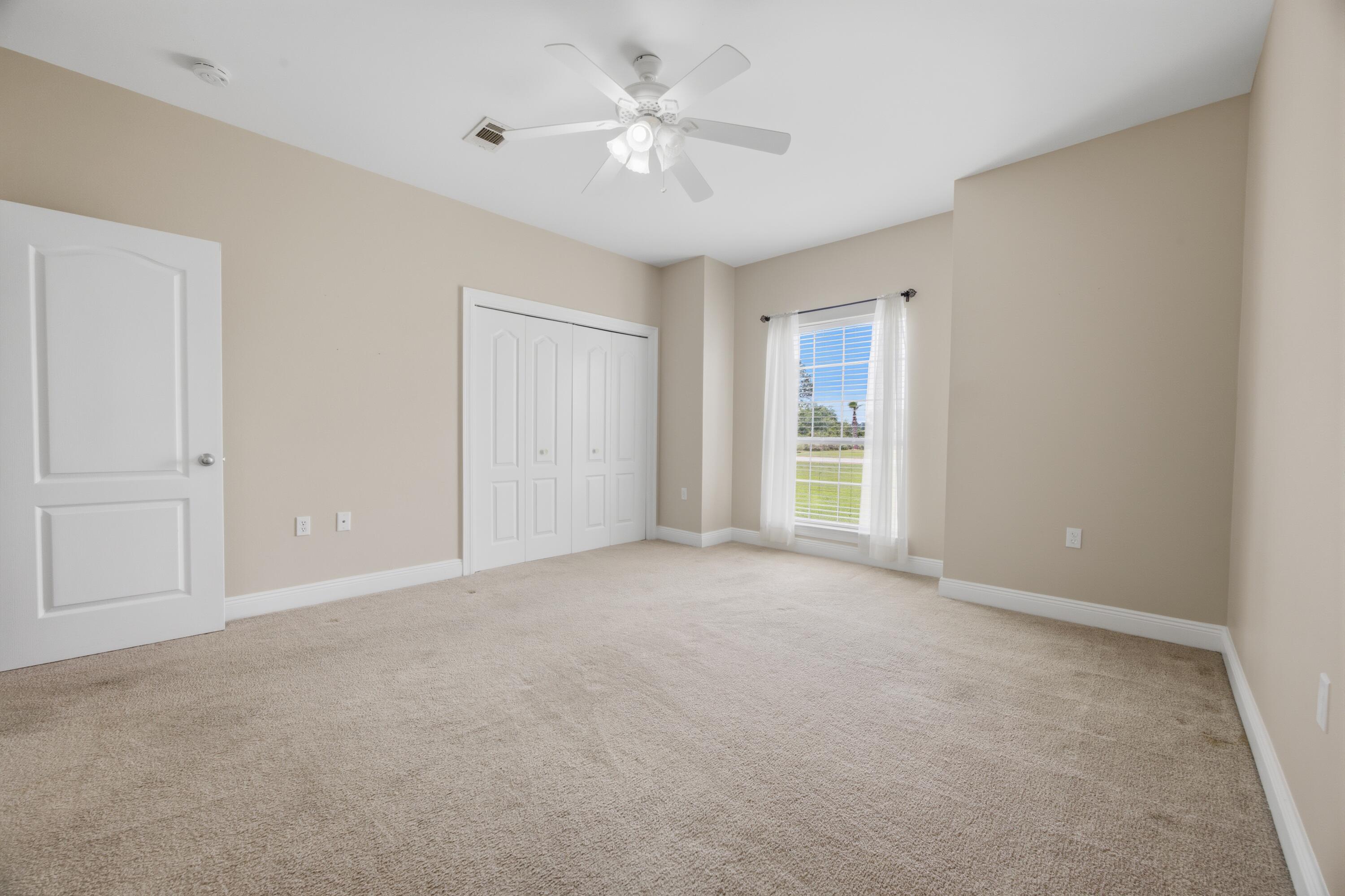 51 Tournament Lane Freeport, FL 32439 - Photo 52 of 71 a view of an empty room with a window