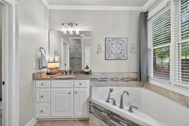 a very nice looking room with a wooden floor and furniture