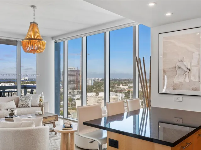 a room with furniture and large window