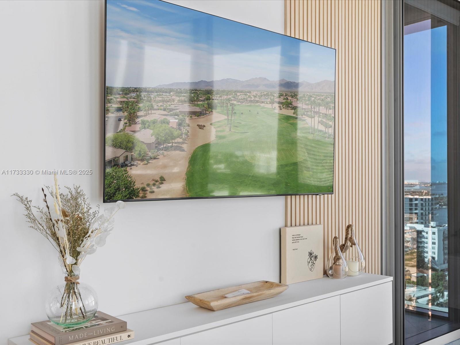 6899 Collins Avenue, Unit 1704 Miami Beach, FL 33141 - Photo 23 of 25 a bathroom with a bathtub and a sink