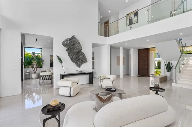 a bathroom with a double vanity sink and mirror