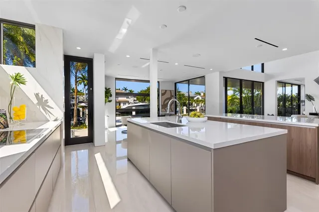a view of a lake with boats and trees in the background