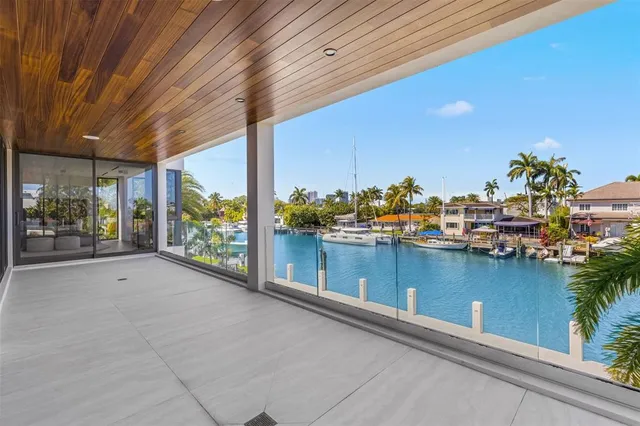 a bathroom with a toilet a sink a shower and a mirror