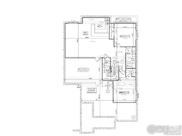 a picture of a bench in front of a wall