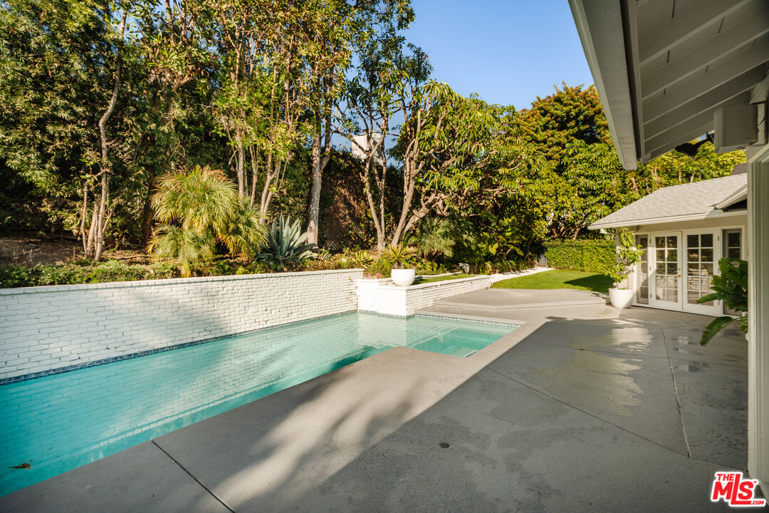 10101 Angelo Circle Beverly Hills, CA 90210 - Photo 5 of 7 a view of swimming pool with an outdoor space