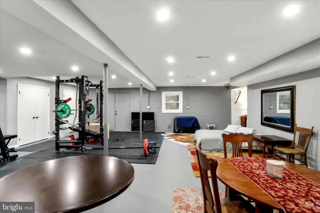 a large hall with lots of furniture and couches