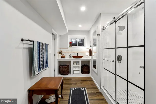 a kitchen with stainless steel appliances a refrigerator sink and stove