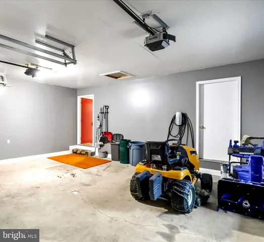 a bedroom with bed and window