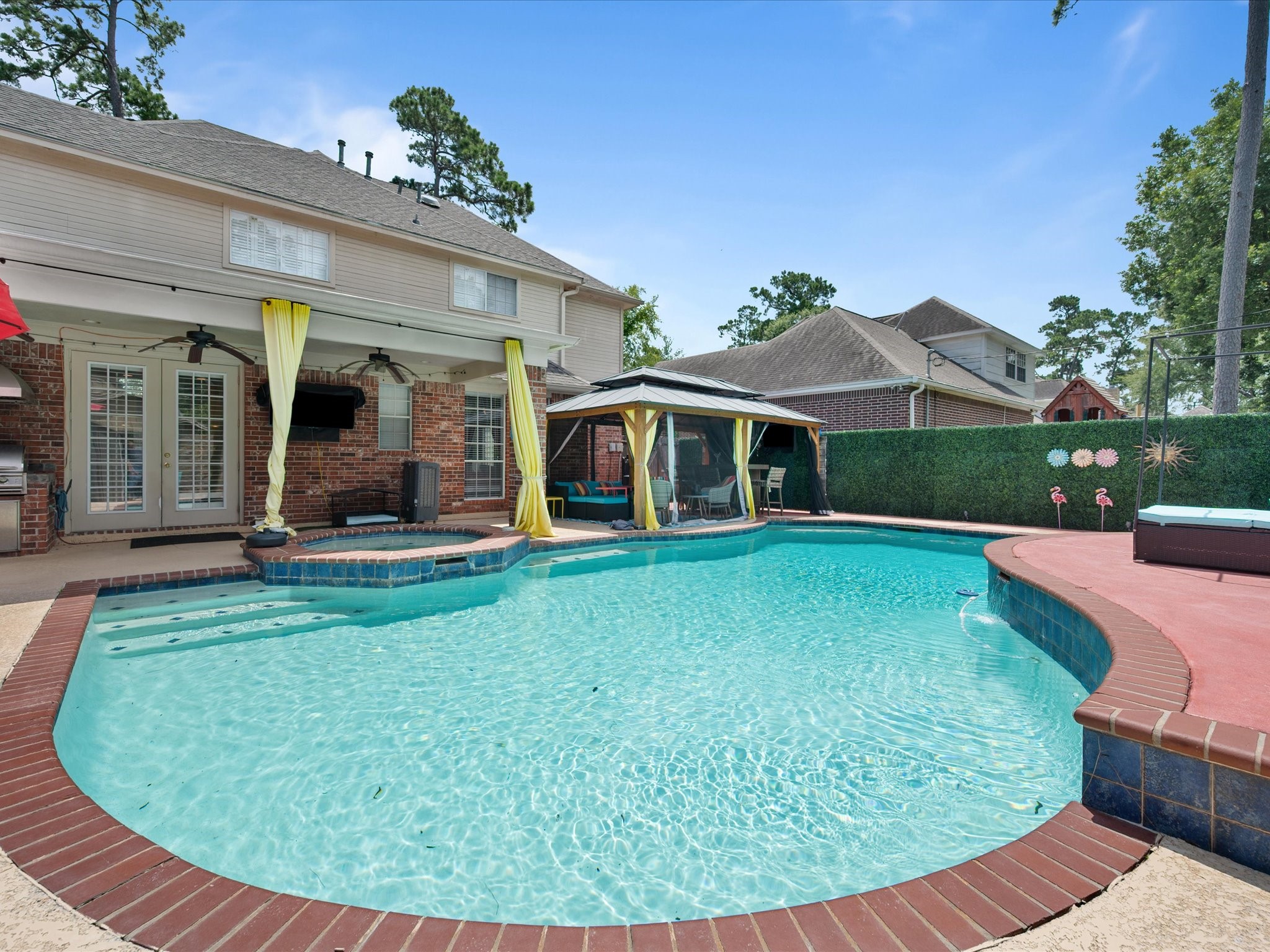 16123 Lafone Drive Spring, TX 77379 - Photo 38 of 47 Every detail of this backyard retreat has been thoughtfully designed, creating a private oasis ideal for both everyday enjoyment and memorable gatherings.