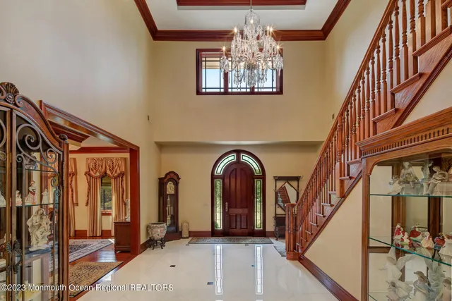 a view of hall way with furniture