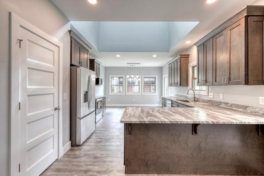 98 Brett Way Hiawassee, GA 30546 - Photo 13 of 39 a large hall with dining table and chandelier