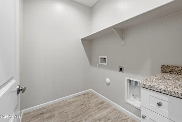 a view of storage and utility room