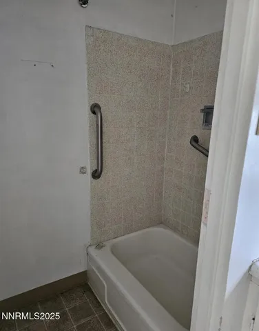 a bathroom with a toilet and a sink