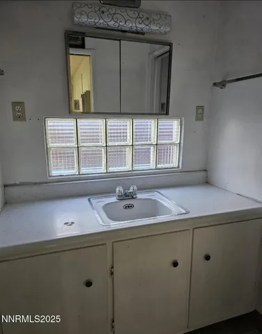 a view of a backyard of the house