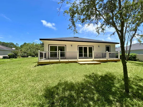 a house with garden in front of it