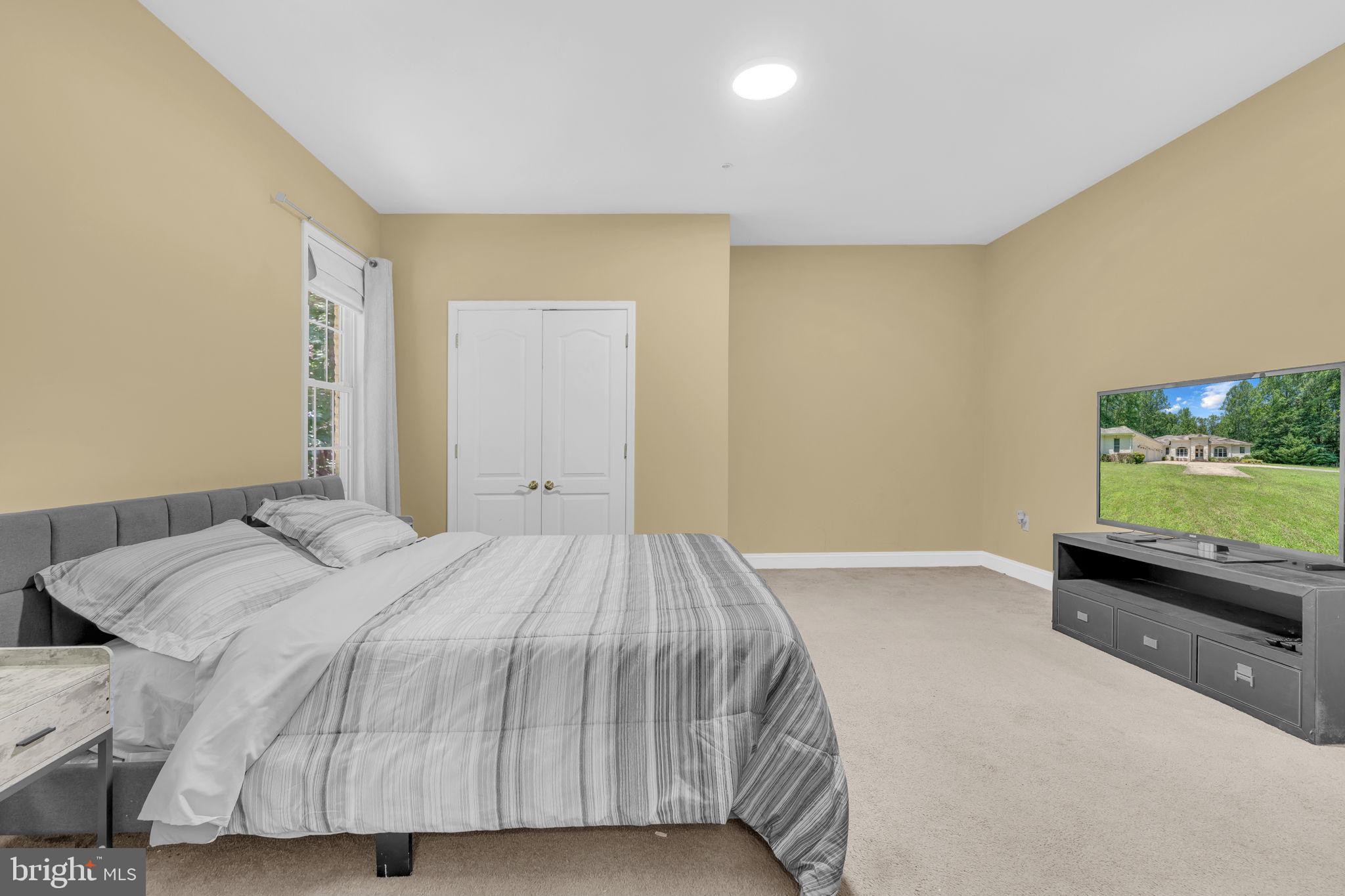 13716 Molly Berry Road Brandywine, MD 20613 - Photo 23 of 75 Sunlit bedroom with a view