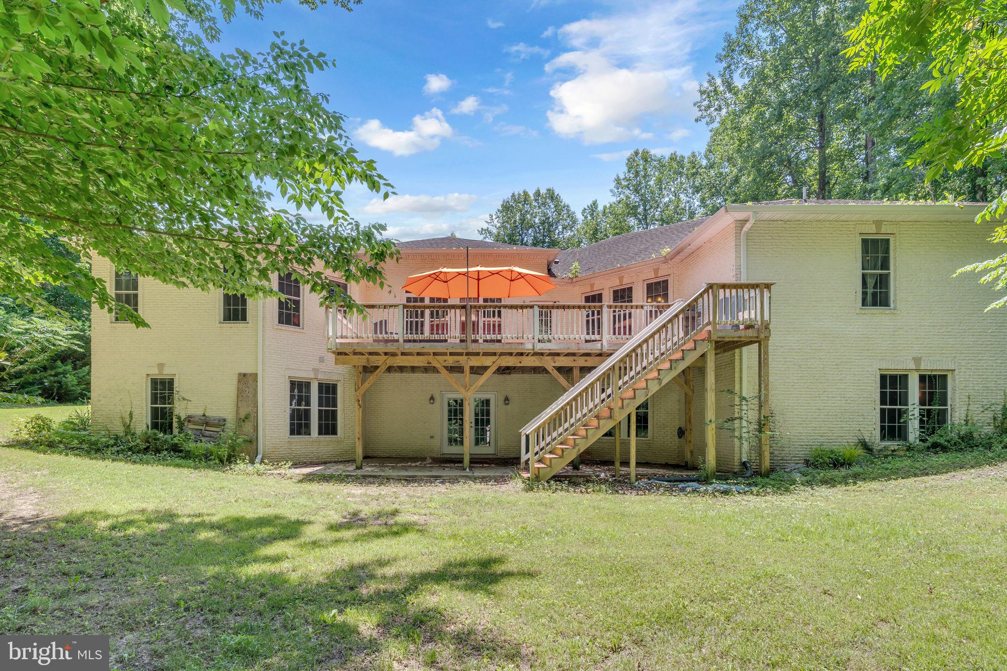 13716 Molly Berry Road Brandywine, MD 20613 - Photo 54 of 75 a view of a house with a park