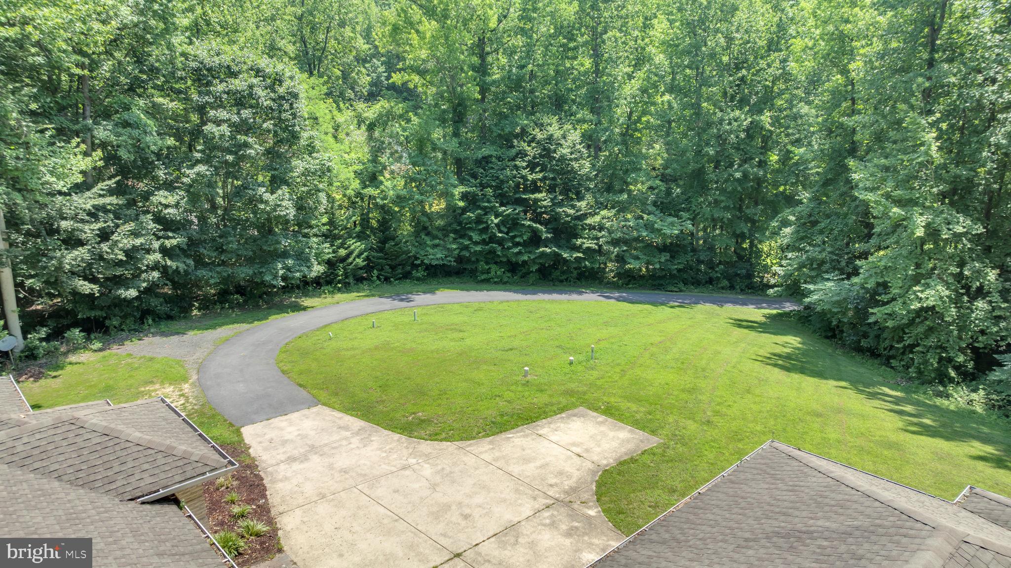 13716 Molly Berry Road Brandywine, MD 20613 - Photo 64 of 75 a view of a backyard